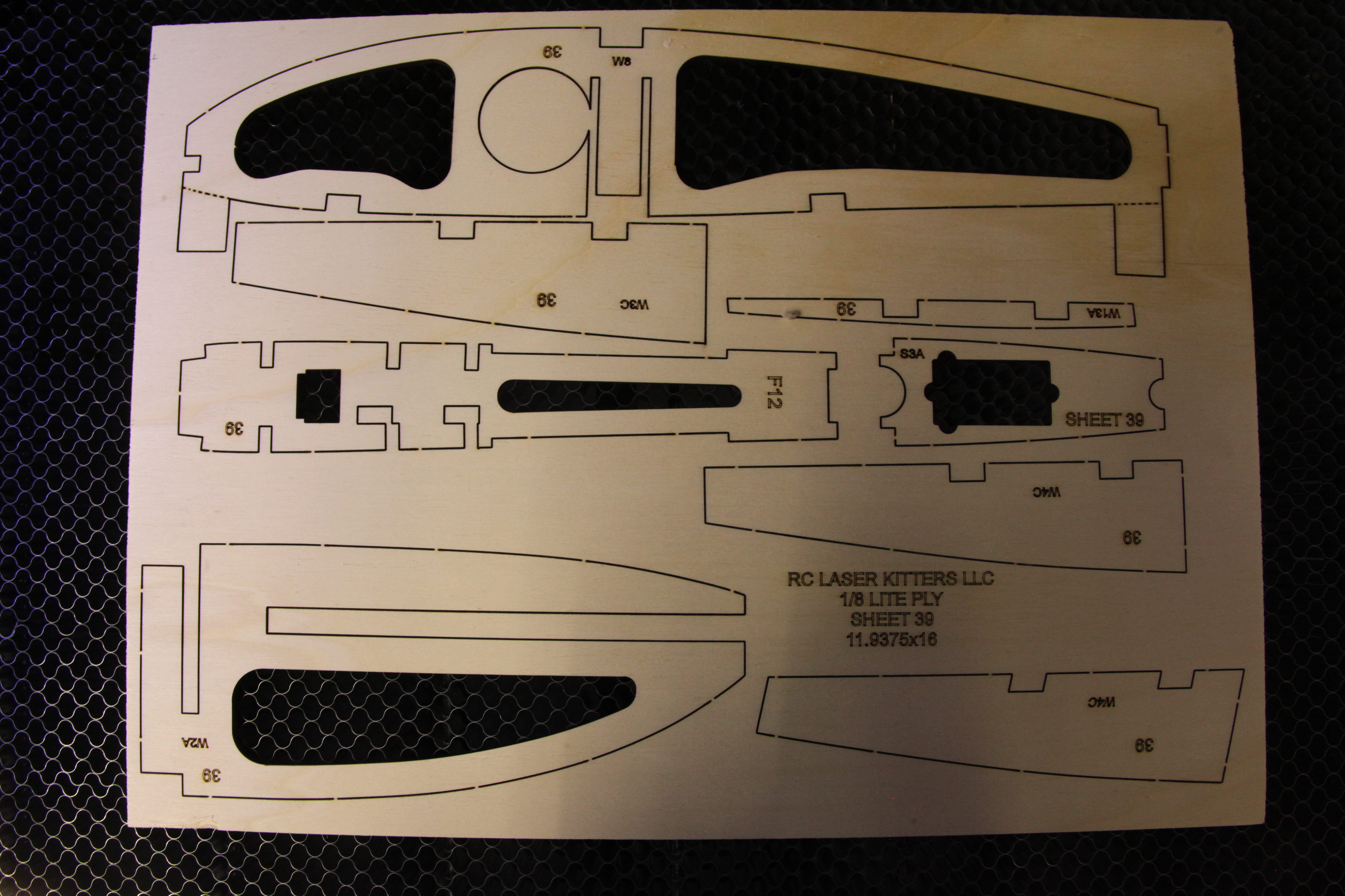 Laser cutter in operation cutting RC plane components